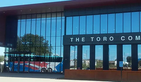 Lorenze charter bus in front of The Toro Company